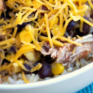 Crock-Pot Taco Chicken Bowls - Bursting with Mexican flavors in this easy recipe for Crock-Pot Taco Chicken Bowls. A quick & easy recipe that can also be made into a freezer meal! [Healthy, Gluten Free, High Fiber, Low Calorie, Low Fat, Low Sugar and just 5 Weight Watchers SmartPoints per serving!] | CrockPotLadies.com