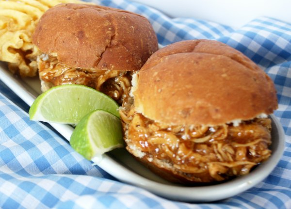 Crock-Pot Barbecue Lime Chicken - Sweet yet zesty this mouthwatering Crock-Pot Barbecue Lime Chicken will have you coming back for more. Chicken breasts or thighs are slow cooked for hours in your favorite BBQ sauce with the addition of fresh lime zest and juice! | CrockPotLadies.com